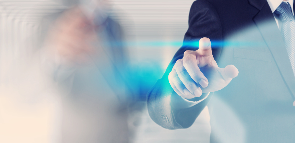 businessman hand pressing button with contact on virtual screens as concept